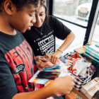 Students choosing their school supplies, backpacks, and more.