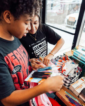 Students choosing their school supplies, backpacks, and more.