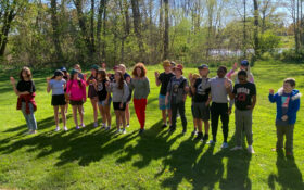 Students taking the Red Ribbon Pledge.