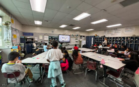 Healthy living session with students in classroom.