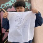 Student shows their bike design.