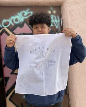 Student shows their bike design.