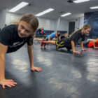 Students working on their push-ups in class.