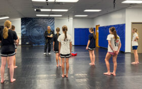 Master Kim and students in class.