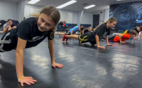 Students working on their push-ups in class.