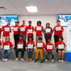 Students with Teen Academy certificates presented upon completion.