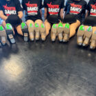 Student decorate their shoes with message, One Pill Can Kill.
