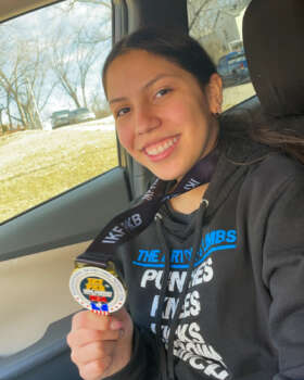 Isabel with her winning medal.