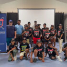 Coach Ron with student group at Youth Baseball Program camp in Delaware