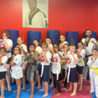 S.M. Smith with students at a Youth Martial Arts Program camp in Ohio