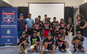 Coach Ron with student group at Youth Baseball Program camp in Delaware
