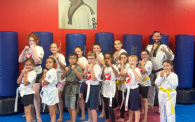 S.M. Smith with students at a Youth Martial Arts Program camp in Ohio